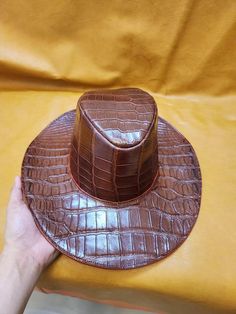 leather cap, brown Embossed Leather Crocodile Hat, Print crocodile leather hat, Cowboy leather hat, print crocodile leather Hat, leather hat *return policy* We do not compromise on quality and comfort. Return and Refund Policy: This item includes a 100% Money Back Guarantee! If you are not completely satisfied with your purchase for any reason, you received damaged, faulty product or you did not receive the size that you originally ordered, just send it back to our return address and we will iss Crocodile Hat, Leather Hat, Hat Print, Custom Jacket, Leather Hats, Crocodile Leather, Leather Cap, Return Address, Embossed Leather