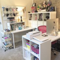 a desk with a laptop computer on top of it next to a book shelf filled with books