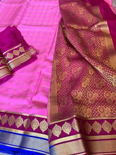 Very lovely color combo with this rich Mysore Silk saree. The saree is pure silk and silk mark certified. Comes with a rich pallu in maroon and a beautiful contrast border to the rosy pink body. The saree is in trendy checks and gives a grand look after draping. Saree comes with a blouse piece in the same color as pallu. Falls and pico is done and saree is ready to wear. Custom Blouse stitching can be done at an additional price. Note that providing accurate measurements for blouse stitching is Silk Anarkali Churidar With Zari Weaving, Anarkali Silk Churidar With Zari Weaving, Pink Pre-draped Saree With Border For Festivals, Traditional Silk Drape Set With Border, Traditional Silk Sets With Border, Festive Silk Set With Border Detail, Pure Mysore Silk Saree, Draping Saree, Blouse Stitching