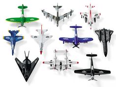 a bunch of toy airplanes that are all different colors