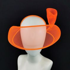 JCN Futuristic Millinery - Neon Edition Hand-made headpiece in copper wire trimmed with orange acrylic band and chenille tips, the netting is hot orange crinoline. Headband in metal.  PLEASE NOTE: the headpiece in natural light on blue background is a different model, color is the same! This collection is a very limited edition and no piece is identical to another.   Each headpiece fits both female and male heads. Everything is hand sewn. Care instructions: Keep away from fire and high heat sour Orange Fitted Headpiece For Kentucky Derby, Orange Fitted Hat For Church, Fitted Orange Hat For Church, Fitted Orange Costume Hats And Headpieces, Fitted Orange Headpiece For Party, Orange Party Headpiece, Fitted Orange Mini Hats For Kentucky Derby, Fitted Fascinator For Costume Occasions, Summer Orange Fitted Fascinator