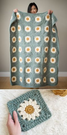 a woman is holding up a crocheted blanket that has sunflowers on it