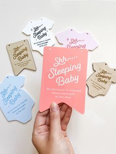 Hand holding a pink colored sign with white writing “shhh… sleeping baby.
Do not knock or ring bell. Leave packages at door” Baby Door Hanger, Baby Door Hangers, Baby Door, Ring Bell, Small Flags, Letterpress Invitations, Cute Signs, Do Not Disturb, Baby Shower Centerpieces