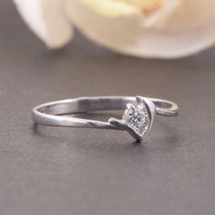 "Solitaire promise ring, Tiny ring, Dainty ring, Elegant ring, Silver ring for her, Promise ring for her, Geometric ring, Unique silver ring WE OFFER UNLIMITED PERIOD INSTALLMENTS PLAN This is a beautiful, stunning, feminine ring that works well for all occasions, styles, and ages. You will love it! Ring information Main stone: White cubic zirconia Approximate size: 3.0mm Metal type: Silver Metal stamp: 925 Sterling SIlver Customization / Replacements It's easy to create jewelry that's perfect f Adjustable Simple Diamond Promise Ring, White Gold Diamond Ring With Simple Design For Promise, Elegant Silver Midi Rings For Promise, Silver Elegant Midi Rings, Anniversary White Gold Ring With Simple Design, Simple Sterling Silver Diamond Ring For Anniversary, Open Ring Solitaire Midi Promise Ring, Dainty Diamond Ring With Tension Setting As Gift, Dainty Rings With Tension Setting For Anniversary