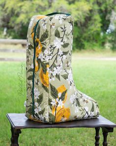 a large bag sitting on top of a wooden bench