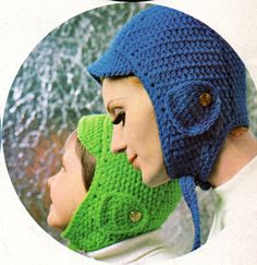 two children wearing knitted hats and scarves