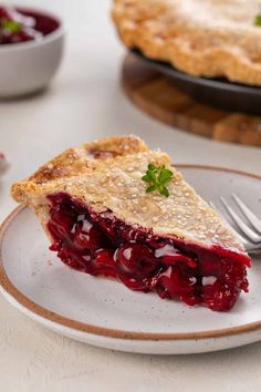 a piece of pie on a plate with a fork