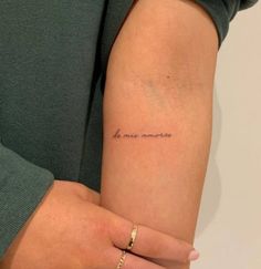 a woman's arm with a tattoo that reads, i love you more than me