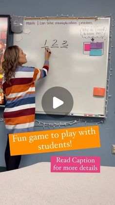 a woman writing on a whiteboard with the words fun game to play with students