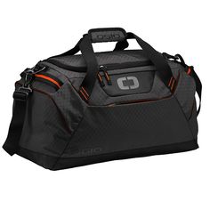 a large duffel bag with an orange and black logo on the front, sitting upright