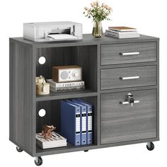 a bookcase with drawers and file cabinets on wheels