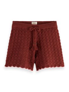 Add a touch of texture to your summer wardrobe with our Pointelle Knitted Short. The intricate pointelle knit design adds a cozy and playful touch to these shorts. Made with soft and breathable fabrics, they are perfect for staying cool and comfortable during the warm weather. Embrace your individuality and express your unique sense of style with the Pointelle Knitted Short. With its versatility and attention to detail, it's the perfect choice for those who celebrate the power of self-expression Summer Pointelle Knit Bottoms, Knit Beach Shorts For Summer, Knit Shorts For Beach In Summer, Knit Shorts For Summer Vacation, Knit Shorts For Vacation In Summer, Casual Knit Beach Shorts, Casual Cotton Shorts With Crochet Trim, Casual Knit Shorts, Knit Beach Shorts