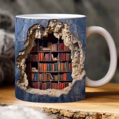 a coffee mug with a hole in the middle filled with books