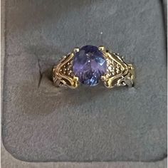 Tanzanite 8mm X 10mm Oval With Diamonds On A 925 Sterling Silver With 14k Gold Accents Size 7 Tanzanite And Diamond Ring, Tanzanite Diamond Ring, Gold Accents, Diamond Ring, Diamonds, Size 7, 925 Sterling Silver, Women Accessories, Sterling Silver