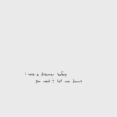 a white wall with writing on it that says i was a dream before you went to let me down