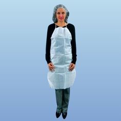 a woman in an apron is standing with her hands on her hips