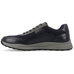 The Thomas sneaker from Vance Co. introduces a perfect blend of style and comfort, featuring a 1-inch sole, lace-up closure, and a classic round toe design. Crafted from a combination of faux leather and fabric this style offers a versatile and contemporary option for casual wear. The fabric lining, 6 mm Tru Comfort Foam™ footbed, and rubber outer sole ensure breathability, comfort, and support, making the Thomas sneaker a trendy and comfortable choice for everyday activities. Navy Sporty Walking Shoes With Rubber Sole, Navy Casual Sneakers With Plain Toe, Navy Lace-up Walking Sneakers, Navy Casual Sneakers, Navy Sneakers With Rubber Sole For Walking, Navy Leather Lace-up Sneakers, Classic Navy Plain Toe Sneakers, Navy Walking Shoes With Rubber Sole And Round Toe, Navy Low-top Walking Shoes