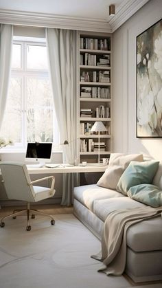 a living room filled with furniture and a computer desk in front of a large window