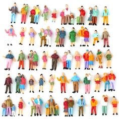 a group of toy people standing next to each other