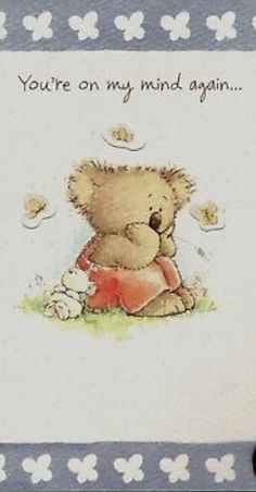 a card with a teddy bear holding a heart and saying you're on my mind again