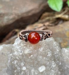 Bright Orange Carnelian and Wire Wrapped Copper Ring.  Size 9. Spiritual Carnelian Ring Jewelry, Spiritual Carnelian Cabochon Rings, Vintage Rings With Natural Stones For Healing, Antique Handmade Carnelian Rings, Handmade Antique Carnelian Rings, Orange Carnelian, Copper Ring, Copper Rings, Bright Orange