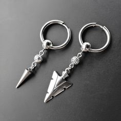 "Pirate style men earrings - This earrings are made with a stainless steel hoop ring, a stainless steel spike pendant and a silver bead - Ring diameter: 18mm - Large aprox: 2'5\" - Two styles to choose - Handmade in Florida, USA" Santi Aesthetic, Piercing Reference, Pirate Earrings, Mens Dangle Earrings, Men's Piercings, Pirate Style, Earring For Men, Mens Earrings, Pirate Fashion