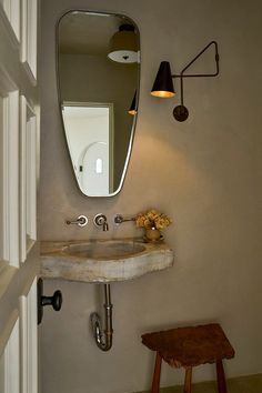 A Mediterranean revival in Hancock Park Tiny Powder Room, Floating Sink, Powder Bathroom, Mediterranean Revival, Rose Uniacke, Brand Vision, Bathroom Shower Design, Bathroom Retreat, Manhattan Apartment