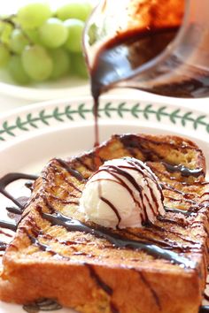 french toast with ice cream and chocolate drizzled on top