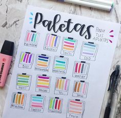 some markers and pens are on top of a piece of paper with the words paletass