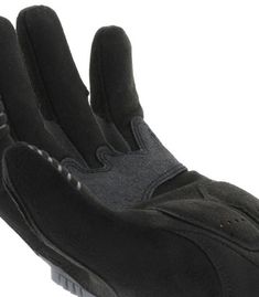 a pair of black gloves sitting on top of each other