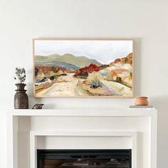 a painting is hanging on the wall above a fireplace