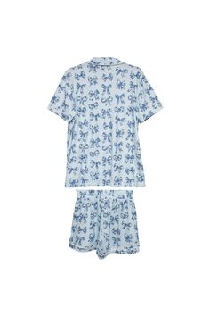 This Toile Coquette Bows Wholesale PJ Set is the ultimate in cozy glam! Featuring a delicate, vintage-inspired bow print, these PJs add just the right amount of fancy to any lounge day. The shorts come with an elastic waistband, an adjustable drawstring, and pockets! Perfect for lazy Sundays, late-night FaceTime calls, or just feeling cute while doing nothing. Grab this set for your boutique and give your shoppers the PJ glow-up they deserve! two piece matching set 95% polyester, 5% spandex mach Coastal Pjs, Fancy Pjs, Two Piece Matching Set, Cozy Glam, Tie Dye Hat, Blank Hats, Coquette Bows, Blue Toile, Love Shack Fancy