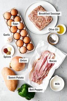 the ingredients to make an egg and ham sandwich laid out on top of each other