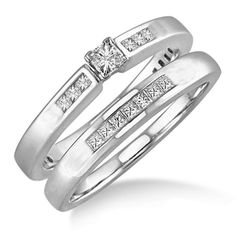 two white gold wedding rings with pink and white diamonds