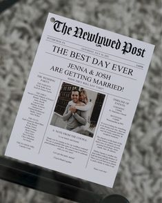 a newspaper is hanging on a glass door with the words, the newlywed post