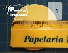 there is a ruler with the word papeleria on it