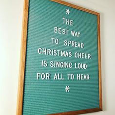 the best way to spread christmas cheer is singing loud for all to hear sign in wood frame