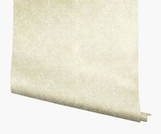 a close up view of a white wallpaper with gold glittering on the edges