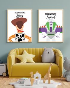 two posters on the wall above a couch in a child's room with toys