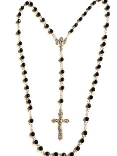 5 Decade Rosary made with stainless steel eye-pins. Silver oxidized chain. Beads are 6mm black glass.  Center is 3/4 inch and is silver oxidized.  Cross is 1 7/8 inches and also silver oxidized.  Cross and center were made in Italy.  The center features Miraculous Medal of Mary surrounded by St. Bernadette and St. Therese of Lusieux.  Rosary is approximately 21 inches in length. Black Crucifix Rosary As Gift, Black Rosary, St Bernadette, Decade Rosary, St Therese, Rosary Catholic, Rosary Chain, Eye Pins, Miraculous Medal