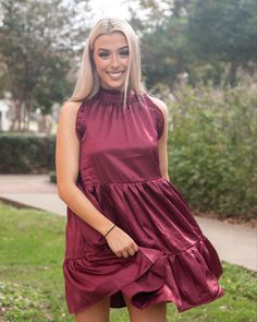 This dress is made of a super shiny, silky material. It includes three-tiers and a high ruffled neck. 

100% Polyester 
Wash Cold with Like Colors / Turn Inside-Out To Wash 
Hang to Dry 
Iron on Low Maroon Dress, Three Tier, Festival Dress, Outfit Of The Day, Sleeveless Dress