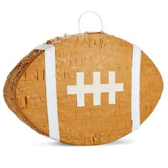 an image of a football ornament made out of wood and woven rafting