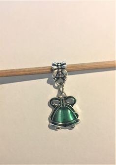 Christmas Bells Charm , Green Christmas bells with Green Bow Charm, Holiday Bells Dangle Charm fits Pandora and other European Bracelets Fits all European Charm Bracelets and necklace too Please ask any questions as I do not accept returns ! Thank You for taking the time to visit my store ! Bracelets Green, Pandora Style, Green Bows, Pandora Bracelets, Dangle Charms, Christmas Bells, Green Christmas, Charm Bracelets, Belly Button Rings