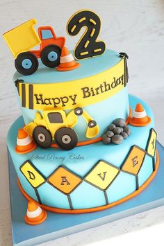 a birthday cake with a construction truck on top