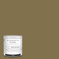 a can of brown paint with the words magnolia home on it's front and side