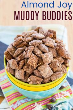 a bowl filled with muddy buddies on top of a table