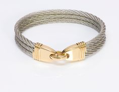 Fred Paris Bracelet.Force 10 bracelet in cable steel and 18K yellow gold by Fred. Approximate Measurements: Length: 7" Width" 0.5" Weight: 43 Grams Paris Bracelet, Art Accessories, Cartier, Rope Bracelet, Antique Jewelry, Leather Bracelet, 18k Gold, Force, Cable