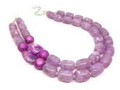 "A classic color that never goes out of style! Lavender / light purple beaded necklace and earring set. Necklace is 16 inches long with a 4 inch extender chain. Earrings are 2\" drop, a matching lavender bead with a fish hook style hardware. Thank you for supporting handmade and small American business! Hate to wait? Me too! I ship 6 days a week. Like this style but prefer another color? Check out our other BIG BEAD necklaces: https://www.etsy.com/shop/PolkaDotDrawer?ref=hdr_shop_menu&search Purple Necklaces With Polished Beads For Party, Elegant Purple Necklace With Large Beads, Purple Beaded Necklace, Purple Bead Necklace, Purple Bridesmaid, Orange Jewelry, Purple Bridesmaids, Necklace Big, Crystal Statement Necklace