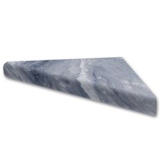 a marble shelf sitting on top of a white wall