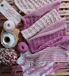 knitting supplies laid out on a wooden table